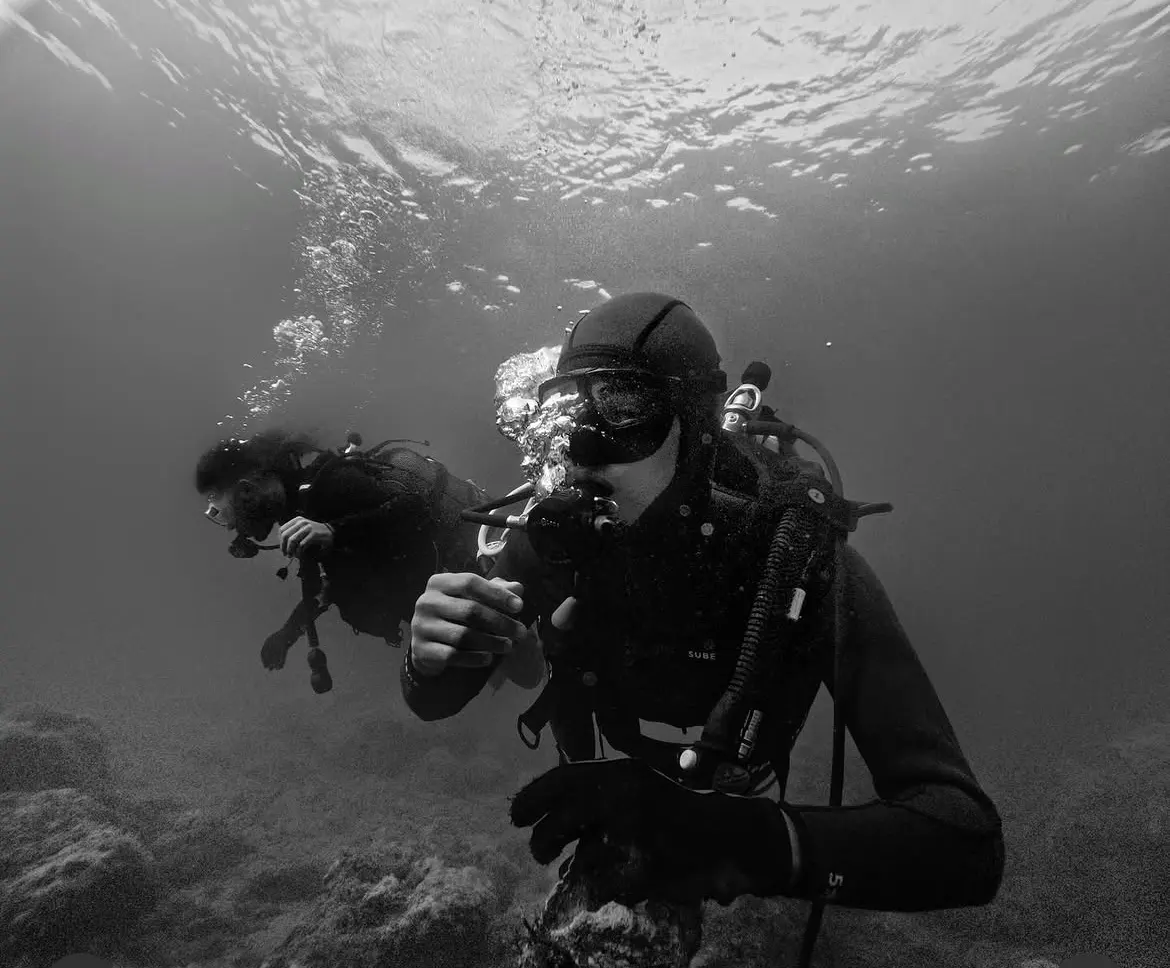 Al Manara Diving local scuba team at Quemado Beach