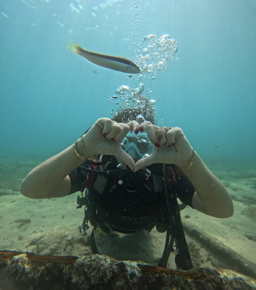 Scuba diver exploring the clear waters of Al Hoceima